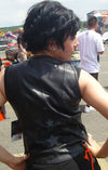 Back view of HighwayLeather women's reflective star leather vest, featuring metallic star details on black leather for stylish protection.