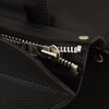 Dynamicleather FIBAG8004 biker bag with leather strap and metal hardware, showing its rugged design and textured leather surface.