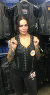Women’s motorcycle leather vest with eyelet trim from Dynamicleather, featuring a stylish and fitted design.