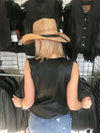 Dynamicleather women's motorcycle vest with rhinestone leather bling details, featuring a stylish and edgy design.