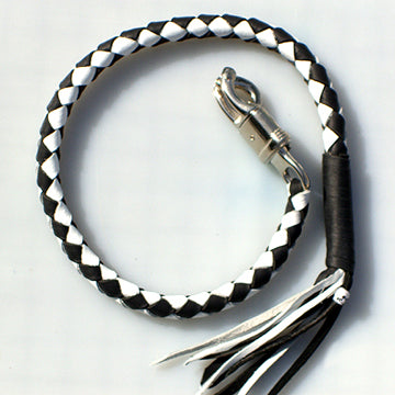 White and black Old-School "Getback" biker whip by Buffalo Leather Gear showcasing rugged leather craftsmanship and classic style.