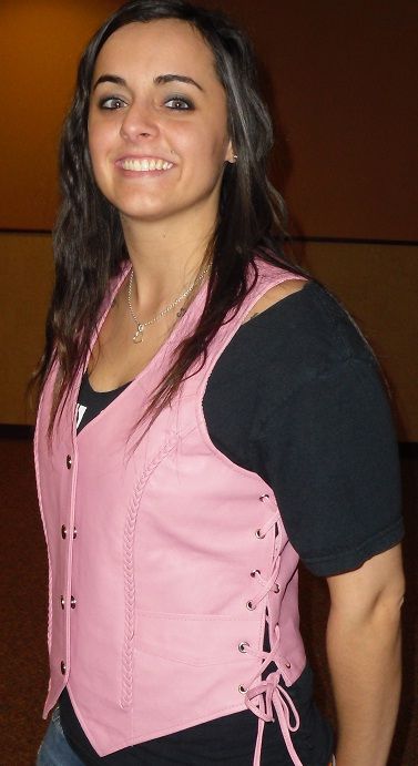 Women’s pink leather vest by Buffalo Leather Gear, featuring a stylish fit and detailed stitching on a woman model.